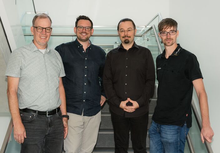 Pressebild franconia.ai mit Christoph Rockenstein (CEO der rockenstein AG), Sven Rausch (CEO der RAUSCH Technology GmbH), Dr. Tristan Behrens (AI Guru), Dr. Florian Göpfert (CISO der rockenstein AG)