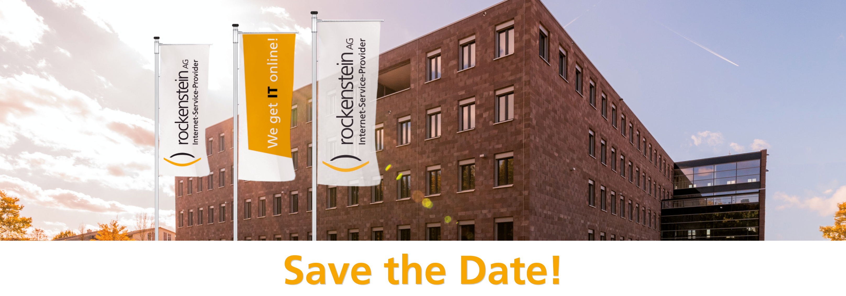 Foto unseres rockenstein Gebäudes, darunter in orangener Schrift: Save the Date!